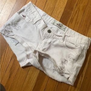 Distressed white shorts ripped